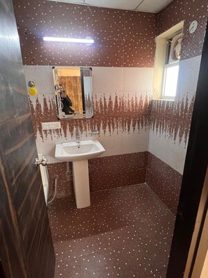 Bathroom in 3 BHK Apartment at Landcraft Golflinks Plaza, Pandav Nagar – for Rent