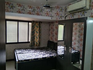 Bedroom in 2 BHK Apartment at Vile Parle West – for Rent