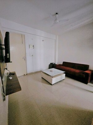 Living Room in 1 BHK Apartment at Breez Global Heights, Sohna Sector 33 – for Rent