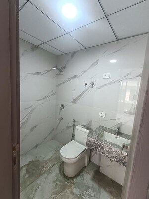 Bathroom in 2.5 BHK Builder Floor at Smart World Gems, Sector 89 – for Rent