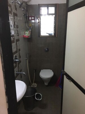 Bathroom in 1 BHK Apartment at Beauty Heights, Bhandup West – for Sale