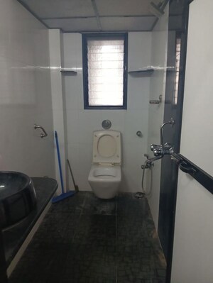 Bathroom in 2 BHK Apartment at Gypsy Rose Apartment, Andheri West – for Rent