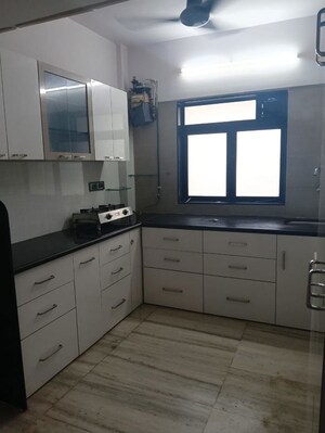 Kitchen in 2 BHK Apartment at Gypsy Rose Apartment, Andheri West – for Rent