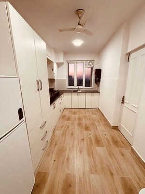 Kitchen in 4 BHK Apartment at DLF Privana South, Sector 76 – for Sale