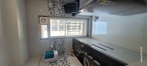 Kitchen in 1 BHK Apartment at Raunak Bliss B1, Ghodbunder Road – for Rent