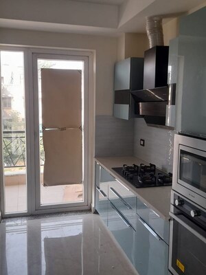 Kitchen in 4 BHK Builder Floor at Ansal Api Versalia 2, Sector 67a – for Sale