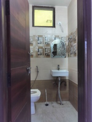 Bathroom in 2.5 BHK Builder Floor at Sain Vihar – for Rent