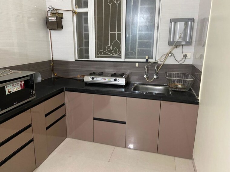 Kitchen, sukhwani-palm-breeze 2 Bedroom 1126 Sq.Ft. Apartment In Pimple Saudagar Pune 10219625