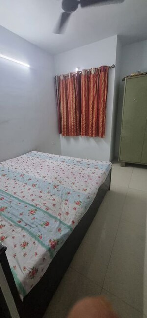Bedroom in 2 BHK Apartment at Lodha Palava City, Dombivli East – for Rent