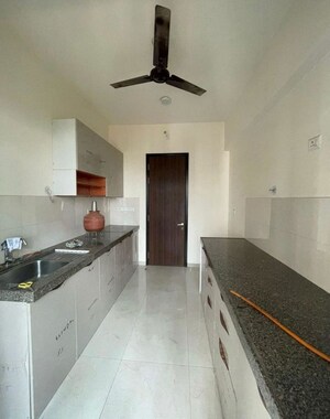Kitchen in 2 BHK Apartment at Piramal Vaikunth, Balkum Pada – for Rent