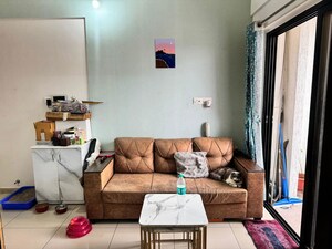 Living Room in 1 BHK Apartment at Duville Riverdale Suites, Kharadi – for Rent