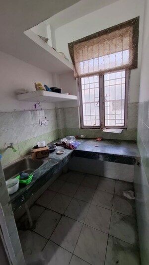 Kitchen in 1.5 BHK Apartment at Sector 10 Greater Noida – for Sale