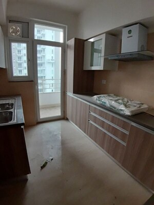 Kitchen in 2 BHK Apartment at Puri Emerald Bay, Sector 104 – for Rent