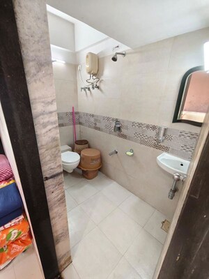 Bathroom in 2 BHK Apartment at Aditya Urvashi CHS LTD, Borivali West – for Sale