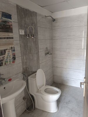 Bathroom in 3 BHK Apartment at Gulshan Bellina, Sector 16 Greater Noida – for Rent