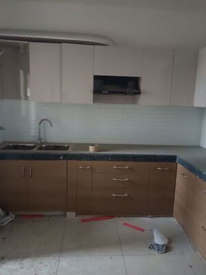 Kitchen in 3 BHK Apartment at Gulshan Bellina, Sector 16 Greater Noida – for Rent