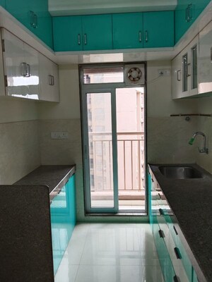 Kitchen in 1 BHK Apartment at Metropolis Aquaris Phase 2, Kasarvadavali – for Rent