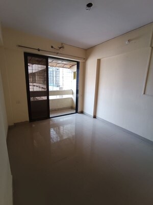 Master Bedroom in 1 BHK Apartment at Ajmera Yogi Dham Phase III, Kalyan West – for Sale