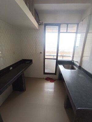 Kitchen in 1 BHK Apartment at Ajmera Yogi Dham Phase III, Kalyan West – for Sale