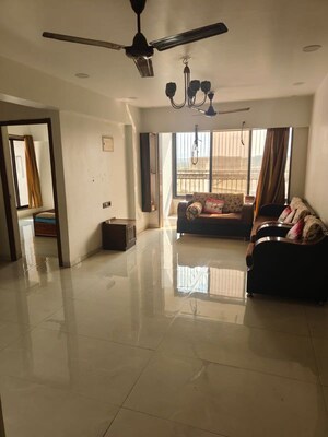 Living Room in 2 BHK Apartment at Swastik Regalia, Waghbil – for Rent
