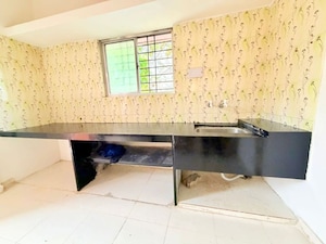 Kitchen in 1 BHK Apartment at Pimple Gurav – for Rent