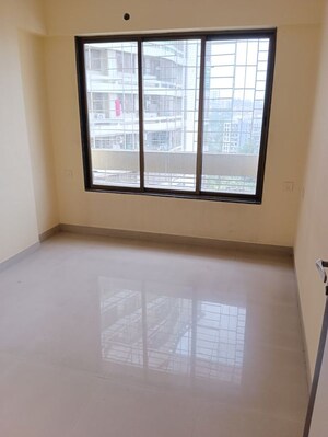 Master Bedroom in 1 BHK Apartment at Ajmera Yogi Dham Phase III, Kalyan West – for Sale