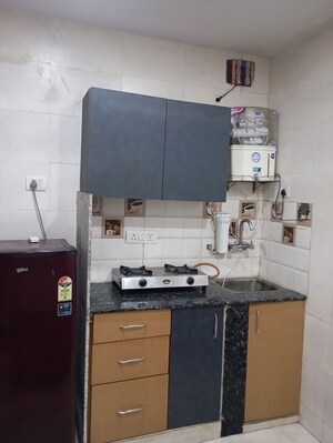 Kitchen in Studio Builder Floor at Kailash Colony – for Rent