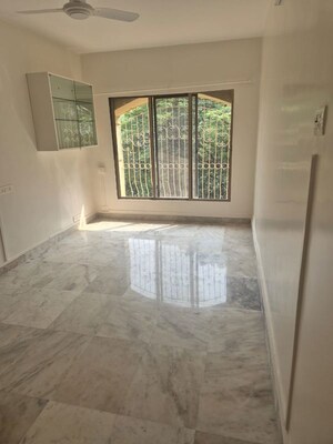 Room in 2 BHK Apartment at Karan CHS Versova, Versova – for Rent