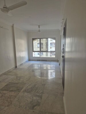 Room in 2 BHK Apartment at Karan CHS Versova, Versova – for Rent