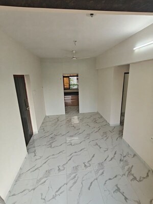 Building Lobby in 2 BHK Apartment at Ossia Shivkari, Borivali East – for Sale