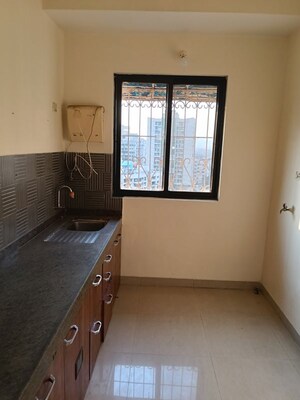 Room in 1 BHK Apartment at Tharwanis Rosalie, Kalyan West – for Rent