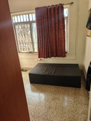 Bedroom in 2 BHK Apartment at Shree Chintamani CHS, Natu Paranjpe Colony – for Rent