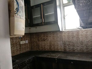 Kitchen in 1 BHK Apartment at AVJ Heightss, Zeta I Greater Noida – for Rent