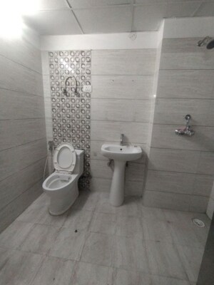 Bathroom in 3 BHK Apartment at Gulshan Bellina, Sector 16 Greater Noida – for Rent