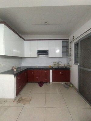 Kitchen in 3 BHK Apartment at Gulshan Bellina, Sector 16 Greater Noida – for Rent