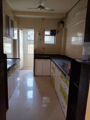 Kitchen in 3 BHK Apartment at Serenity CHS	, Jogeshwari West – for Rent