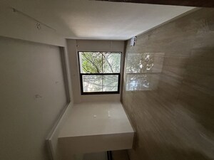 Living Room in 2 BHK Apartment at Je And Vee Om Trimurti, Malad East – for Sale