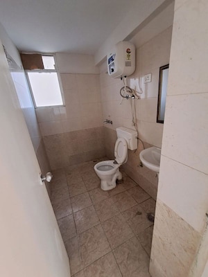 Bathroom in 2 BHK Apartment at Shree Vardhman Green Court, Sector 90 – for Rent