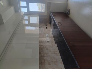 Kitchen in 3 BHK Apartment at Amrapali Heartbeat City, Sector 107 – for Rent