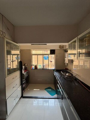 Kitchen in 1.5 BHK Apartment at Bramha Skycity Apartment, Dhanori – for Rent