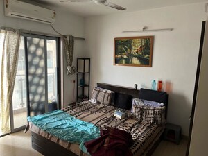 Bedroom in 2 BHK Apartment at Dev Leo Tower, Oshiwara – for Rent