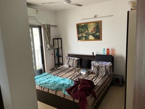 Bedroom in 2 BHK Apartment at Dev Leo Tower, Oshiwara – for Rent