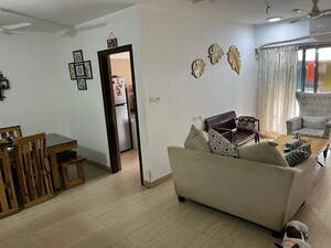 Living Room in 2 BHK Apartment at Dev Leo Tower, Oshiwara – for Rent