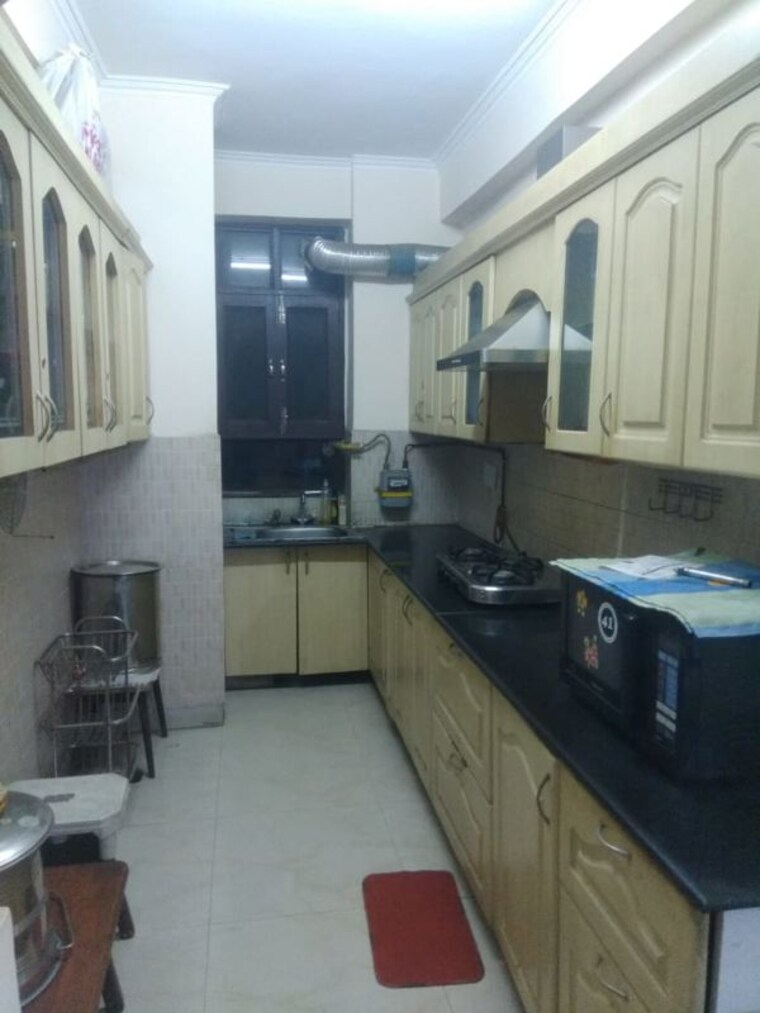 Kitchen, agarwal-associates-aditya-suntech-city 3 Bedroom 1700 Sq.Ft. Apartment In Vasundhara Sector 5 Ghaziabad 10222003