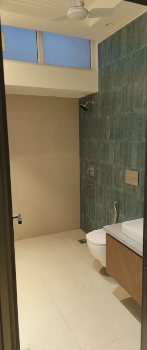 Bathroom in 4 BHK Apartment at Vasant Vihar – for Rent