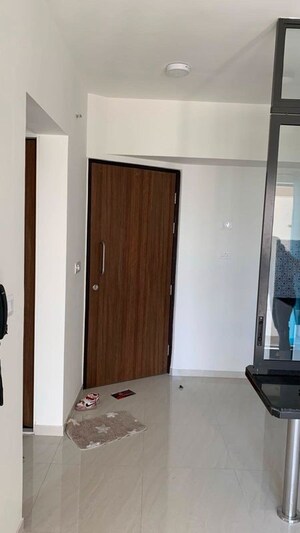 Living Room in 1 BHK Apartment at Lodha Crown Quality Homes, Majiwada – for Rent