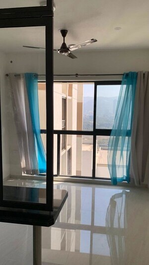 Living Room in 1 BHK Apartment at Lodha Crown Quality Homes, Majiwada – for Rent