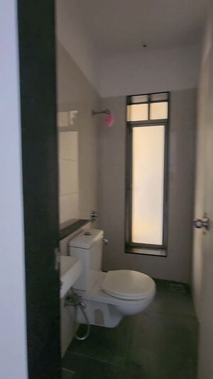Bathroom in 3 BHK Apartment at Sheth Vasant Lawns, Laxmi Nagar – for Rent