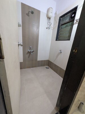 Bathroom in 1 BHK Apartment at Nisarg Hyde Park, Kharghar – for Rent
