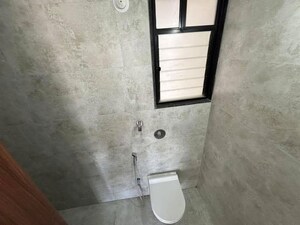 Bathroom in 2 BHK Apartment at Unique Youtopia, Kharadi – for Rent